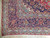 Corner detail showing indigo main border, sky blue guard stripes and clean ivory cotton fringe