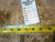 Back of rug tag reading rug number 6208 and size 2.8 x 20 with tape measure