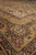 8'10" x 12' Indian wool rug corner showing gold border medallion and olive accents