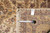 Back of this Jaipur rug with hand woven Oriental rug tag F-4103 and tape measure
