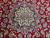 Central Esfahan medallion with pistachio arabesques, camel palmettes and sky blue petals on red