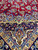 10x14 Persian Najafabad rug border and field junction with gold cusped frame and navy palmettes
