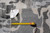 Back label reading Made in India beside a tape measure confirming width of the rug