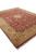 Corner to corner view of 9x13 Indian hand-knotted wool rug in red and gold palette