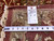 Back tag reading rug number 6858, size 9 x 12, with tape measure across fringe