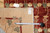 Inventory tag F-4143 and tape measure confirming the 9x12 dimensions of this modern wool rug
