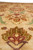 8'11" x 11'7" wool rug detail showing stacked palmettes across the open beige field