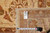 Reverse of 8'11" x 11'7" rug with woven tag, rug number F-4174 and tape measure