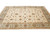 Light blue border framing ivory field on large 9x12 Indian Agra rug for living room