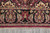 End border along the 12 foot length with paired palmettes, cartouches and ivory fringe