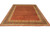 Coral Zigler Agra rug with beige scroll borders shown from the front on white