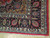 Corner detail showing navy boteh border, ivory floral guard bands and original cotton fringe