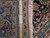 10x14 Kashan rug border with measuring ruler, authenticity tag and hand-knotted ivory cotton fringe