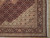 Corner detail with ivory guard stripes, paisley vine border and beige spandrel flowers