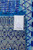 Reverse side with maker label reading Design 8609, colour Aqua Blue, hand knotted in India