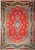 Red Persian Sarouk rug with navy floral border, ivory corner lobes and lobed center medallion