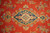 Detail of navy and ivory medallion with rose, gold and powder blue floral clusters
