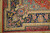 Corner detail of navy border, ivory scrolling vine guard stripe, pink roses and lotus blossoms
