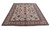 Angled studio view of large ivory 10x13 Tabriz wool rug showing full all over pattern