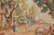 Close-up of dancing couple, tall trees and distant farmhouse woven on ivory field