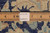 Pile close-up beside ruler with authentic handmade label showing cotton foundation and knot density