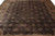 9' x 11'5" Tibetan rug field detail with repeating beige rosettes and cross motifs