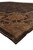 Side angle of the brown Tibetan rug corner highlighting copper and sage border cartouche detail
