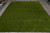 9' x 11'10" Gabbeh rug laid on grey tile showroom floor under overhead light