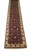 Full length 2'6" x 24'6" red Chobi runner rug photographed upright on white studio background