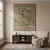 Green tapestry wall hanging displayed above a dark wood console in a neutral living room setting