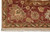 Border close-up with cream palmettes, olive leaves and dark brown outlines on a coral rust ground