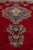 Pile depth view along the medallion pendant showing lustrous wool and fine knotting work