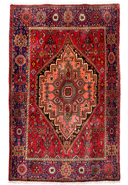 Full view of a 4x6 Persian Gholtogh rug with red central medallion on a navy background