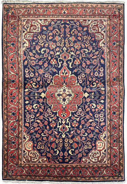 Full view of a 3x5 Vintage Persian Sarough Rug laid out, displaying the rich navy blue field and elaborate border designs