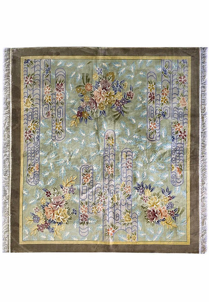 Full view of the 8x8 Vintage Oriental Art Deco Square Rug showing its sage green background, pastel blue scrollwork, and multi-colored floral bouquets hand-knotted in wool with taupe border and ivory fringe.