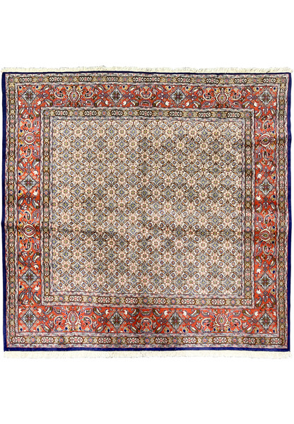 Full view of 6'4 x 6'6 square Persian Moud rug showing ivory Herati field and red floral border.