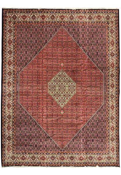 Full view of rare size Persian Bijar iron rug with deep red field, ivory medallion, dense Herati pattern, and highly detailed floral border