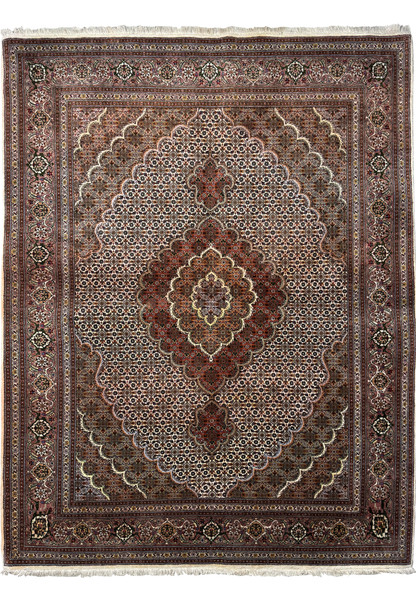 Full view of a 5x7 Persian Tabriz Mahi rug laid out flat, displaying the detailed central medallion, elaborate corner brackets, and the ornate border design with a cream fringe.