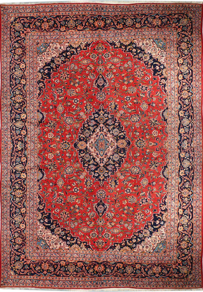 A front-facing image of a Persian Kashan rug laid flat, showing the entire pattern with a vibrant red field, central medallion, and intricate floral and geometric patterns in shades of blue, cream, and orange.