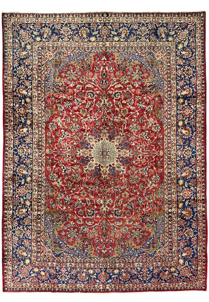 Full view of the 9'9 x 14'5 vintage Najafabad Persian rug featuring a large medallion, ruby red field, and navy floral borders.