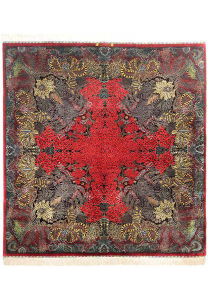 Full view of a 6'6 x 6'9 signed Erami Persian Qum pure silk rug with dense red floral field and intricate botanical design