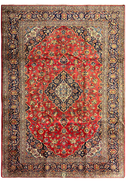 Close-up view of a beautiful 9'2" x 12'5" Persian Kashan rug, showcasing its vibrant red field adorned with intricate floral patterns and a central medallion. The rug features a rich palette of blues, golds, and ivory, highlighting the detailed craftsmanship and high knot density typical of Kashan rugs. The ornate border complements the central design, adding depth and elegance. This image captures the exquisite details that make this Persian rug a stunning piece of home decor.