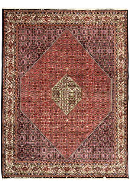 Full view of rare size Persian Bijar iron rug with deep red field, ivory medallion, dense Herati pattern, and highly detailed floral border