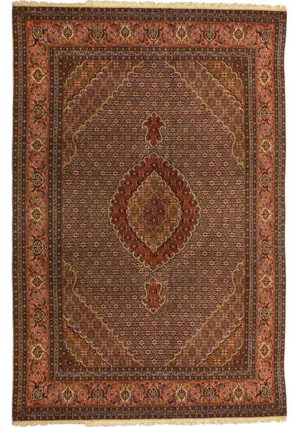 Full view of 6'6 x 10 Persian Tabriz Mahi rug with allover Herati design and earth tone palette