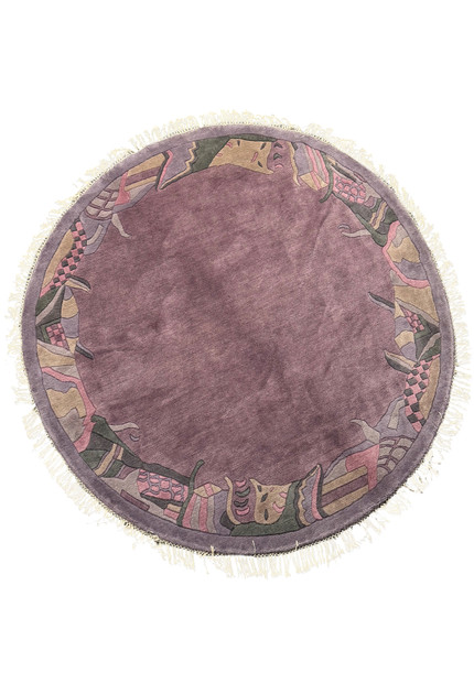 Full circular view of the mauve Nepali rug with abstract pastel border and ivory fringe