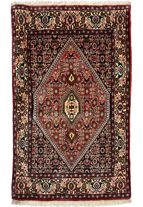 Experience opulence with our Bijar rug, showcasing a mesmerizing 3x5 size. Its rich colors and intricate motifs add a touch of Persian elegance to any room