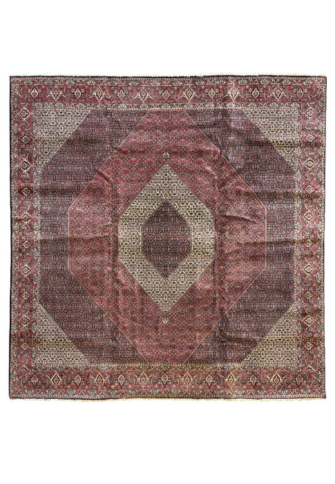 Full view of a grand 13 x 13 Persian Bijar square rug laid out to showcase its rare size and detailed geometric and floral designs in deep reds and blues