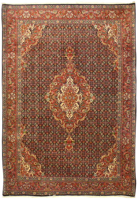 Full view of 6'9 x 9'8 Persian Bijar rug with navy field and red medallion