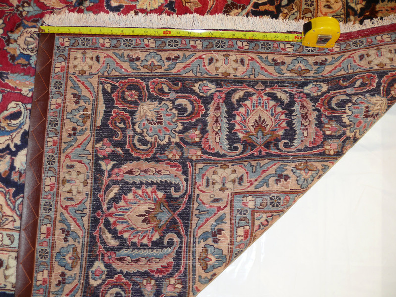 Close-up of intricate designs on 9'8 x 14'8 Persian Kashan Rug
