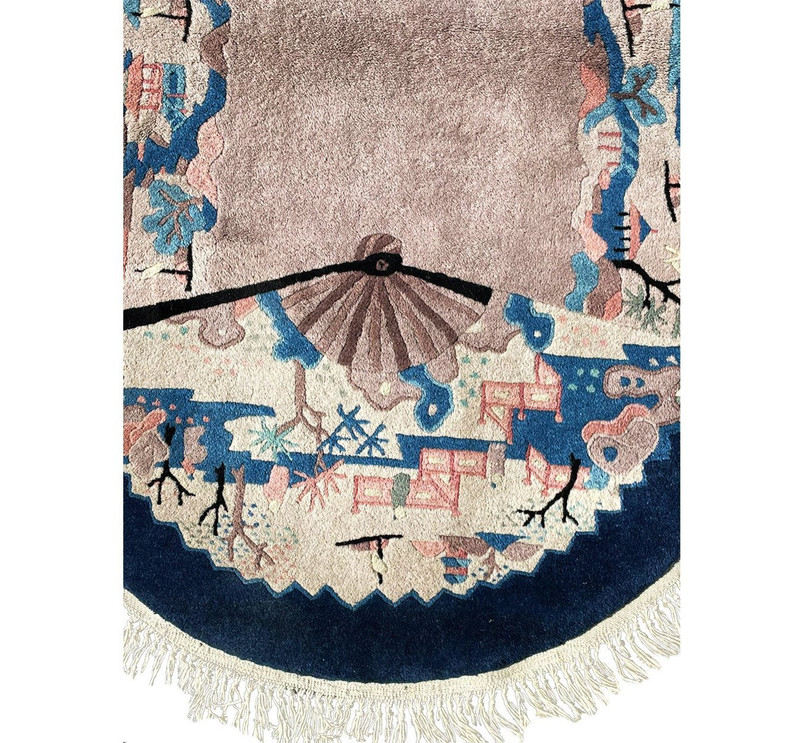 Border of a 2'3" x 5'5" Oriental Art Deco Oval Rug